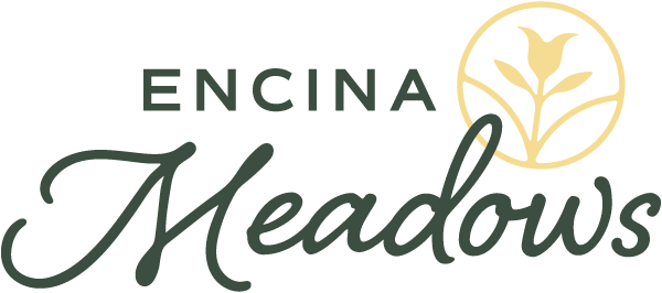 an image of the engina meadows logo on a green background